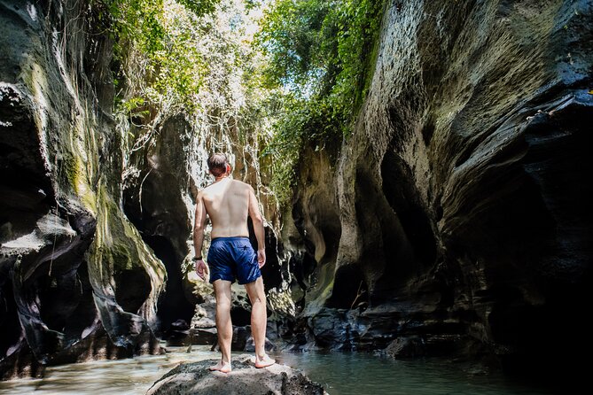Bali Adventure Tour: Hidden Canyon, Tegenungan Waterfall, Goa Gajah temple - Beji Guwang Hidden Canyon: sacred rocks, water, lockers, and real effort
