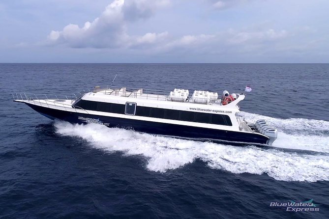 Blue Water Express Boat Transfer From Serangan Or Padang Bai To Lombok Or Vice Versa - Onboard Comfort on the Lombok Strait: Seating, Sundecks, and Cold Towels