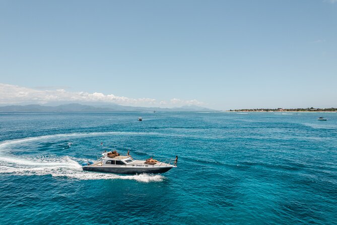 Full Day Nusa Penida by Honey Milk Yacht 13 meters - Boat Comfort: Flybridge, Sundeck Mats, Bluetooth Sound, and Cool Box Treats