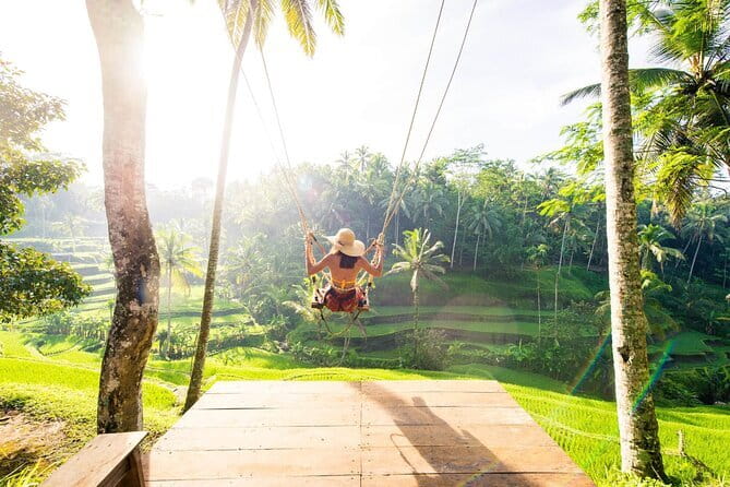 Full Day Private Tour to Ubud Waterfall and Uluwatu Sunset - Uluwatu Temple on a Cliff: Ocean Views and Monkey Path Energy