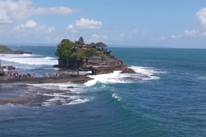 Half Day Tanah Lot Temple Private Guided Tour - Stop 1: Taman Ayun’s Fish Pond Peace and Royal Water Garden