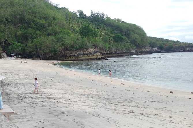 Nusa Penida East And West Full Day Private Guided Tour - Atuh Beach: Clear Water Meets High Cliff Photo Angles
