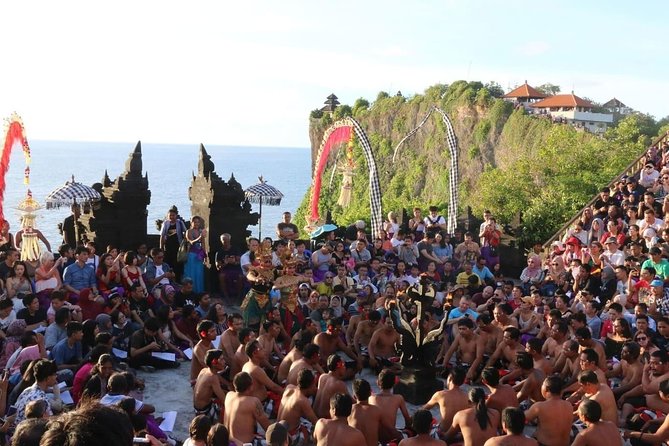 Tanah Lot and Uluwatu Temple Tour Including Seafood Dinner at Jimbaran Beach - Stop 1: Tanah Lot Temple and the ocean-rock setting