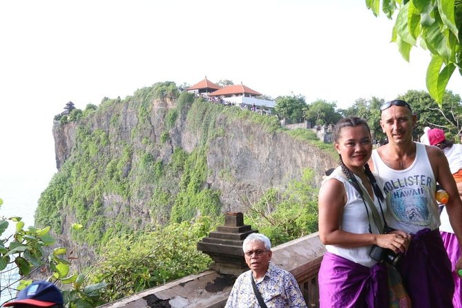Tanah Lot and Uluwatu Temple Tour Including Seafood Dinner at Jimbaran Beach - Stop 2: Uluwatu Temple, cliff views, and macaques