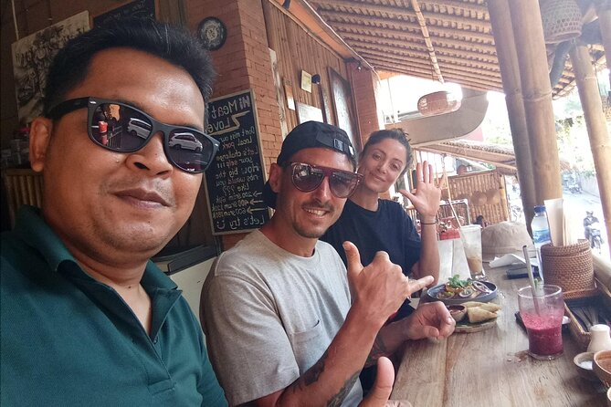 Ubud Tour Monkey Forest, Rice Terrace, Swing, Temple, Waterfall - Tegenungan Waterfall, green surroundings, steps, and possible swim time