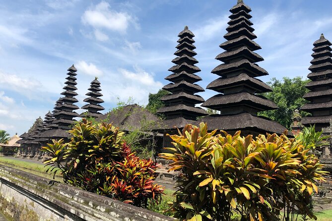Ulun Danu Bratan Temple with Tanah Lot Sunset - Tanah Lot Sunset on the rocky coast: where photos meet sea temple mythology
